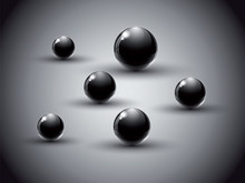 Black Glass Balls On Abstract Background.