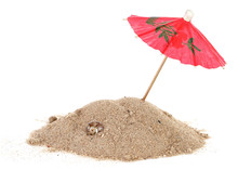 Cocktail Umbrella In Sand Mound With Shells