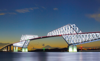 Tokyo gate bridge and Mountain Fuji at twilight time