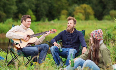 Sticker - group of tourists playing guitar in camping