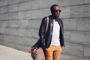 Wall Mural - Street fashion concept - stylish handsome african man