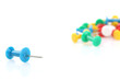 © Studio KIVI - blue pushpin against other
