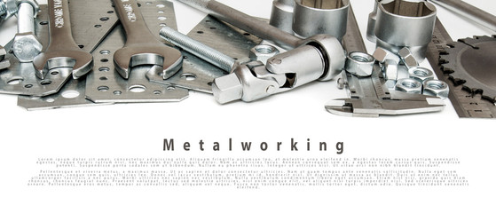 Metalwork. Ruler, caliper and others tools on white background.