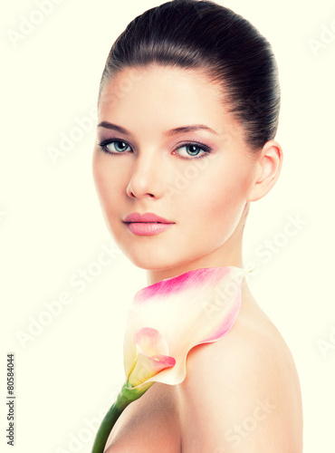 Naklejka dekoracyjna Beautiful face of young pretty woman with healthy skin.