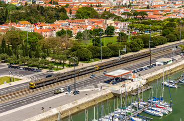 Poster - Suburban train passing by a street of Lisbon - Portugal