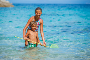 Canvas Print - Kids playing in the sea