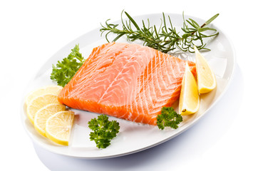 Fresh raw salmon steak on white background