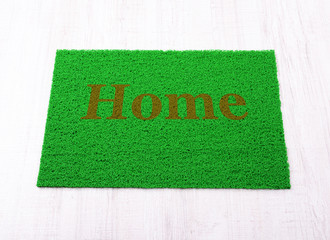 Wall Mural - Green carpet on floor close-up