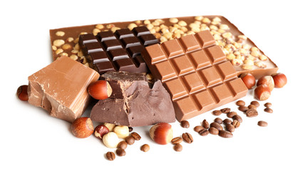 Wall Mural - Chocolate bars with hazelnuts and coffee beans isolated on