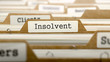 Insolvent Concept with Word on Folder.