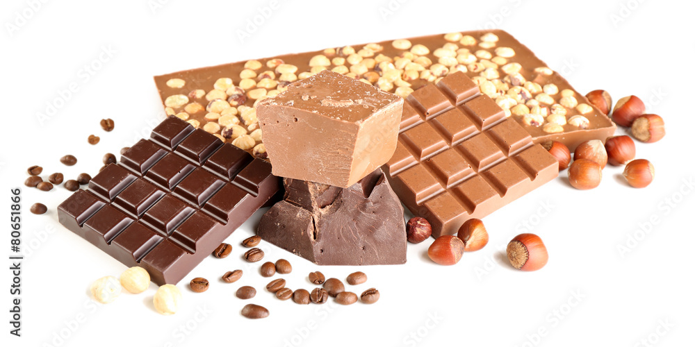 Chocolate bars with hazelnuts and coffee beans isolated on