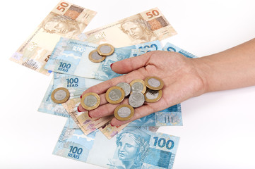 Wall Mural - Woman's hand and Brazilian money