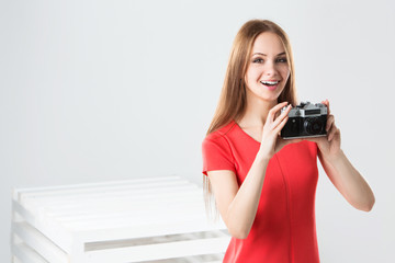 Wall Mural - smiling girl with camera