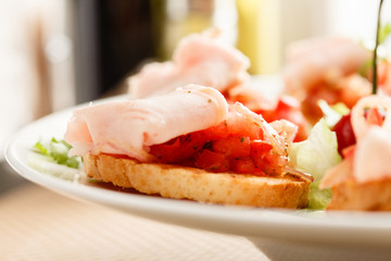 Canvas Print - Bruschetta with tomato and ham