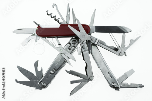 Pocket knife or Steel multi-function tools isolated on white Tablou Canvas