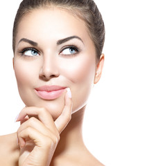 Wall Mural - beauty portrait. beautiful spa girl thinking and looking up