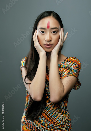 Fotomural beauty young asian girl with make up like Pocahontas, red indian