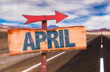 April Sign With Road Background