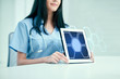 © Syda Productions - close up of doctor showing hologram on tablet pc
