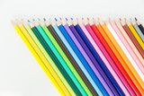 Fototapeta Tęcza - Row of color pencil crayons