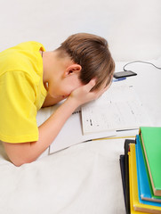 Wall Mural - Sad Teenager doing Homework