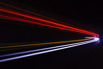 Car light trails in the tunnel.