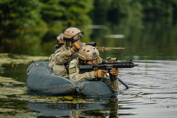 Poster - Rangers team ferried by boat across the river