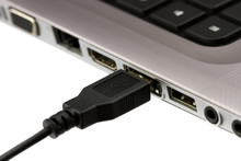 USB Cable Plugged In To Laptop Computer  