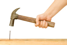 Hammer and Nail Using hammer and nail on wood