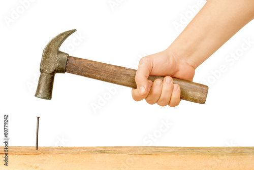 Hammer and Nail Using hammer and nail on wood Tableau sur Toile