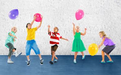 Wall Mural - Multiethnic Children Balloon Happiness Friendship Concept