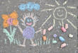 sidewalk spring chalk painting with sun, flower and doll