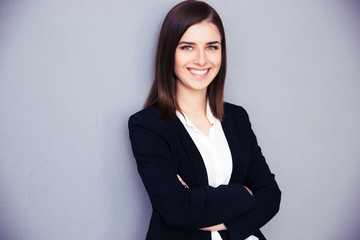 Sticker - Happy young businesswoman with arms folded