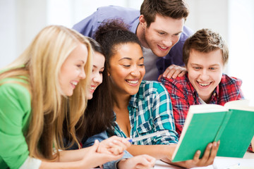 Canvas Print - students reading book at school