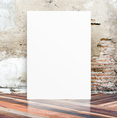 Poster - White Blank Poster in crack cement wall and diagonal wooden floo