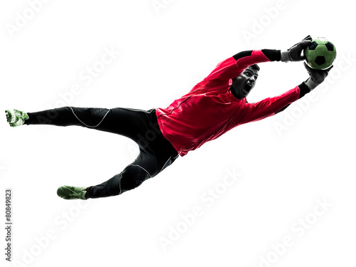 Fototapeta na wymiar caucasian soccer player goalkeeper man catching ball silhouette