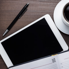 office table of businessman with tablet computer