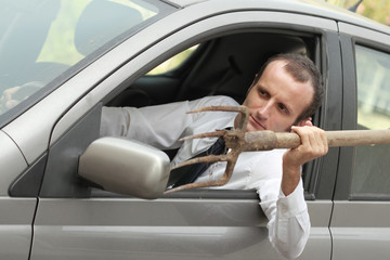 Wall Mural - Angry man in the car