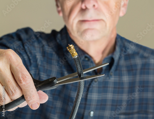 Fotografía Concept isolated photo of cutting cable cord