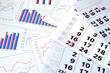 Financial charts and calendar