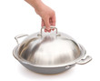 hand about to lift up a lid of wok with clipping path