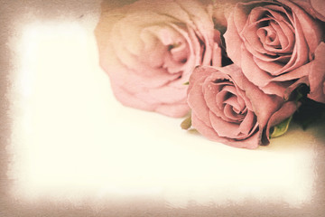 Vintage paper texture, Pink roses bouquet with space for text.