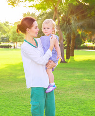 Wall Mural - Happy mother with little daughter