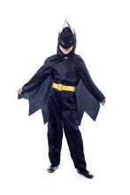 Studio Shot Of Cute Boy Dressed As Batman