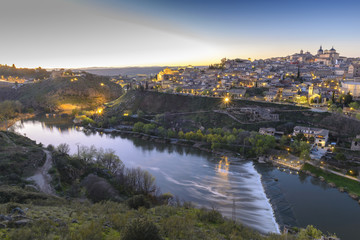 Wall Mural - Panoramic view of Toledo at dusk (Spain)