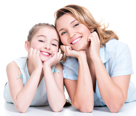 Portrait of smiling mother and young daughter