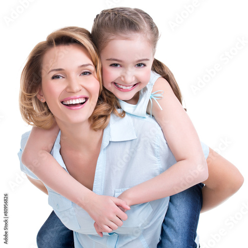 Fotografie, Obraz Closeup portrait of happy mother and young daughter