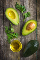 Canvas Print - food background with fresh organic avocado, lime, parsley and ol