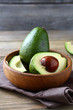 avocado in a wooden bowl