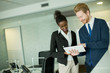© BGStock72 - Young couple in the office